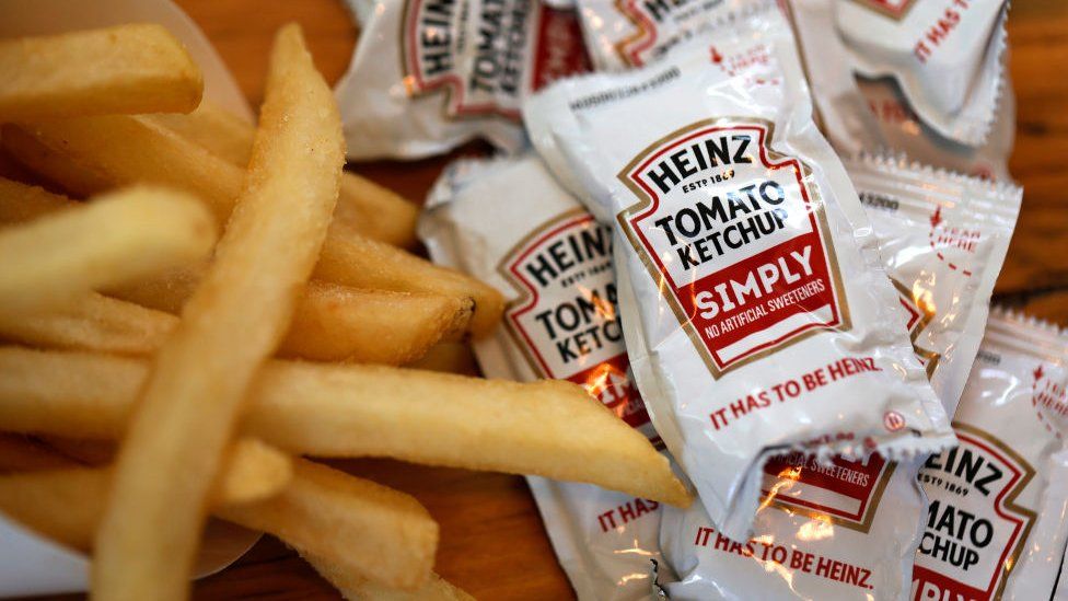 Sachets of Heinz ketchup with french fries