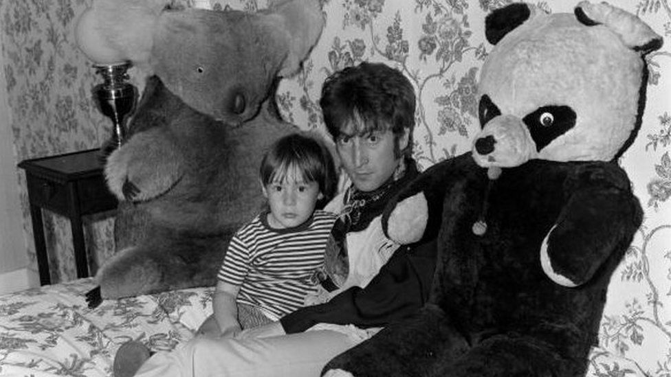 January 1968: British rock singer, songwriter and guitarist John Lennon (1940 - 1980), of Beatles fame, with his son Julian, at their home in Weybridge.