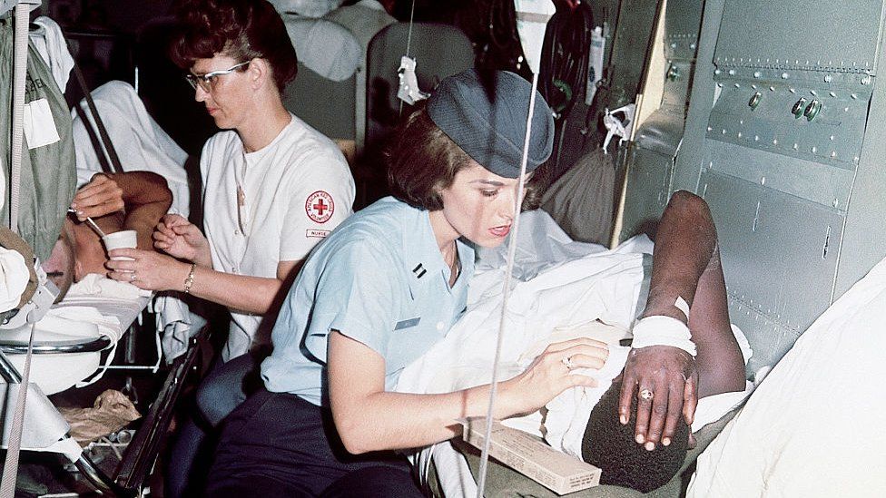 Nurses care for wounded US soldiers in Vietnam, 1967