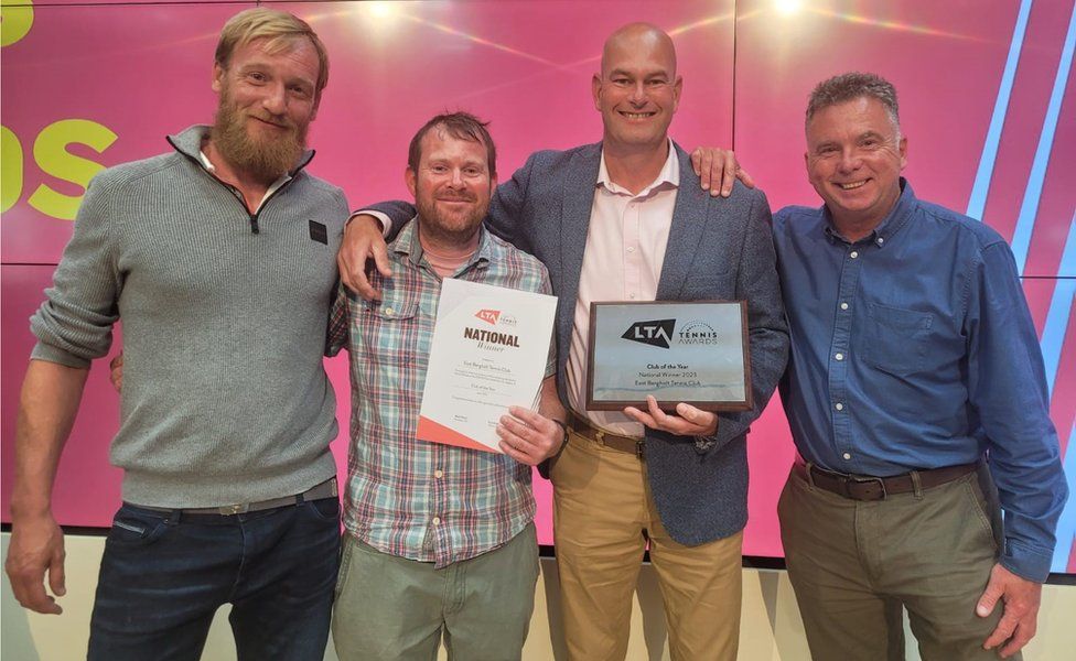 From left to right, member Richard Baldwin, chairman Paul Cansdale, head coach Matt Watson and member Paul Anderson holding the award won by East Bergholt Tennis Club