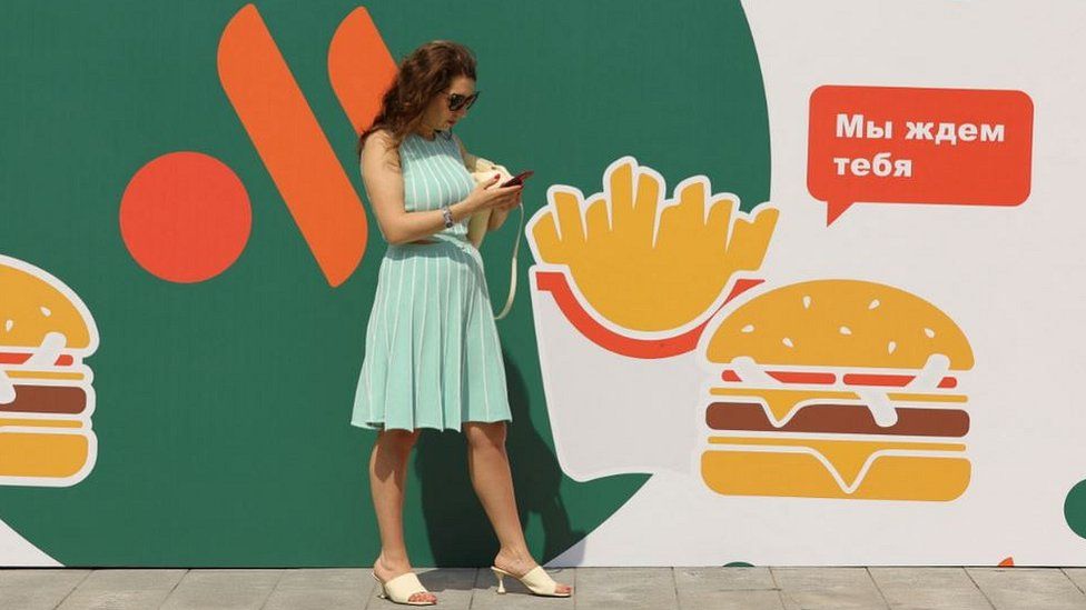 Woman at rebranded McDonald's in Moscow, 12 Jun 22