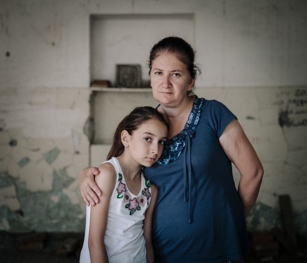 Aneta and Alana pictured in the room where they were held captive, 10 years on