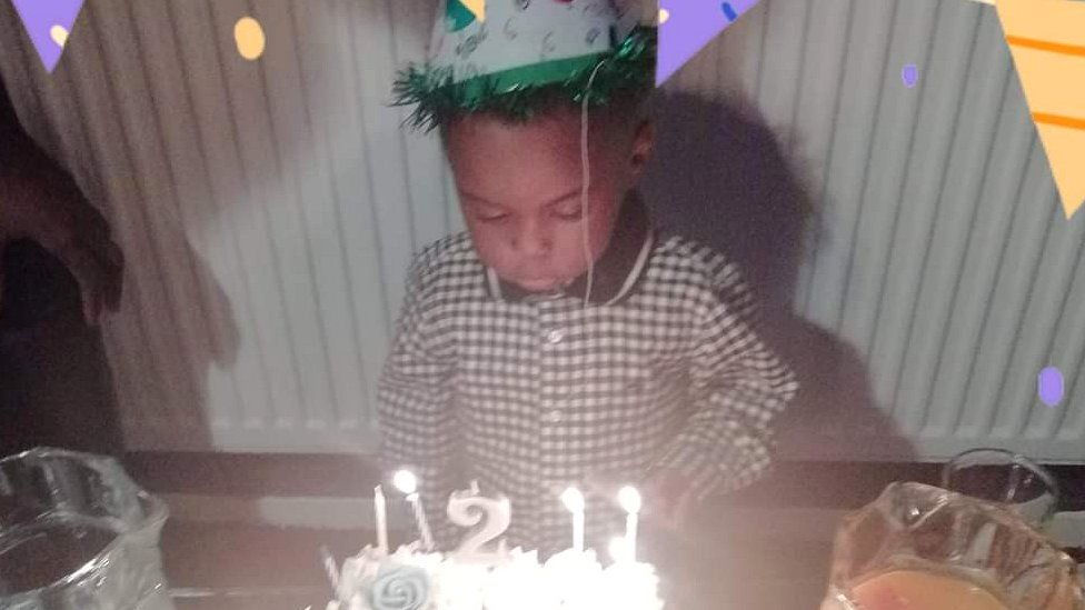 Awaab Ishak with his birthday cake