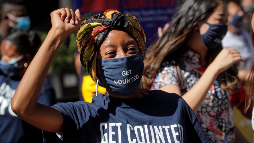 A woman in a Get Counted facemask at a promotional event for the US census in Times Square, New York, in September 2020