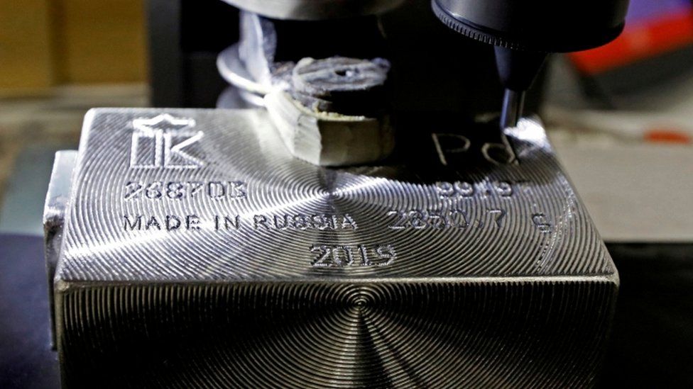 A machine engraves information on an ingot of 99.97% pure palladium at a plant of Krastsvetmet