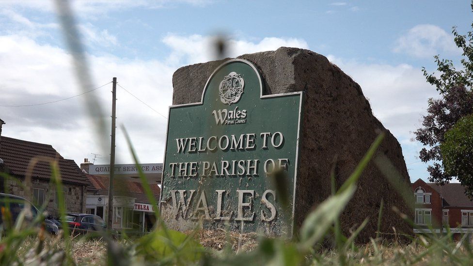 A sign saying welcome to the parish of Wales