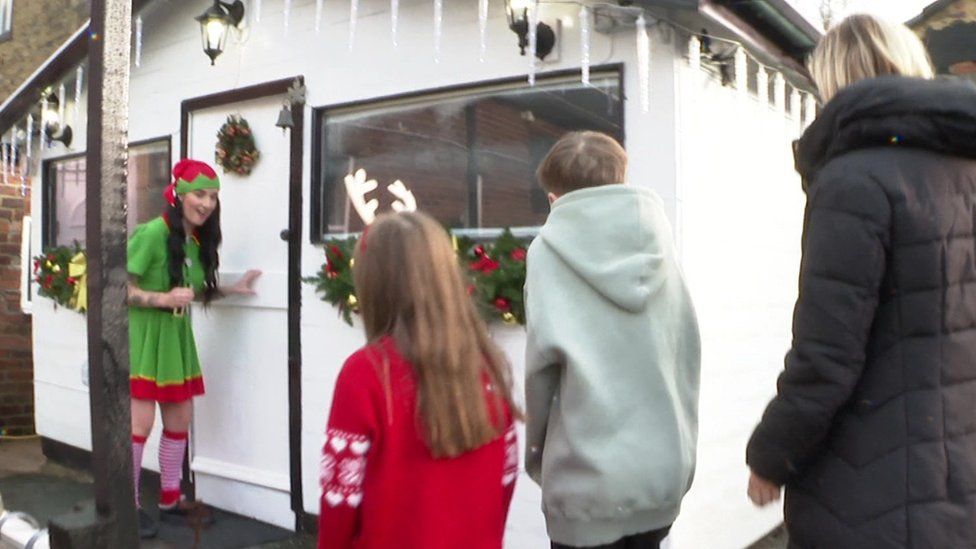 Visitors make their way to the grotto