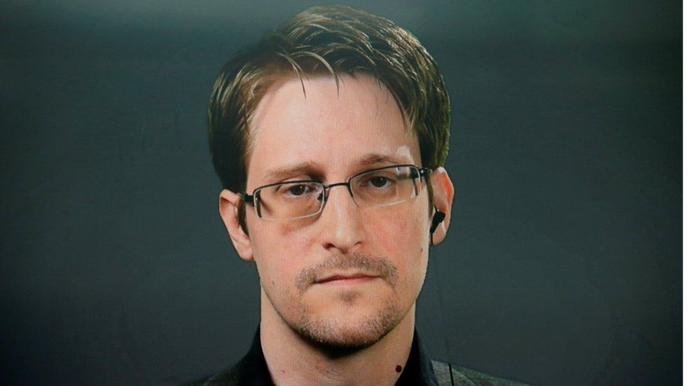 Edward Snowden speaks via video link during a news conference in New York