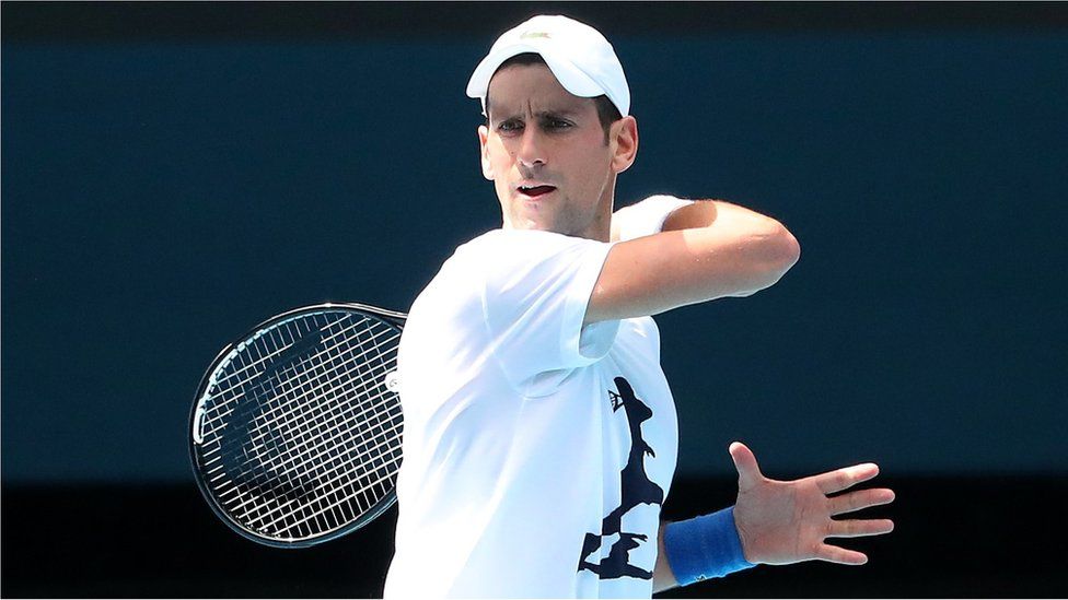 Novak Djokovic of Serbia practices on Rod Laver Arena ahead of the 2022 Australian Open at Melbourne Park on January 11, 2022 in Melbourne, Australia.