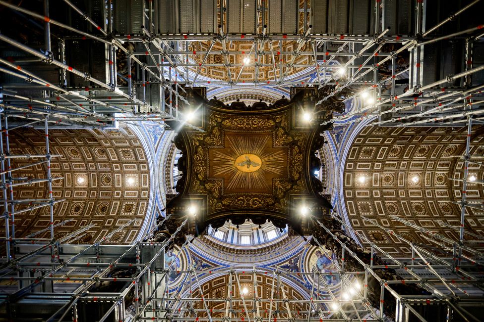 A view of scaffolding around a baroque sculpted bronze canopy by Gian Lorenzo Bernini over the high altar of St. Peter's Basilica in preparation for its restoration, at the Vatican, February 21, 2024.