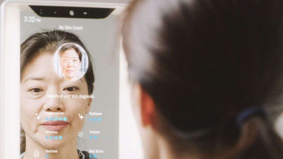 A woman using a smart mirror