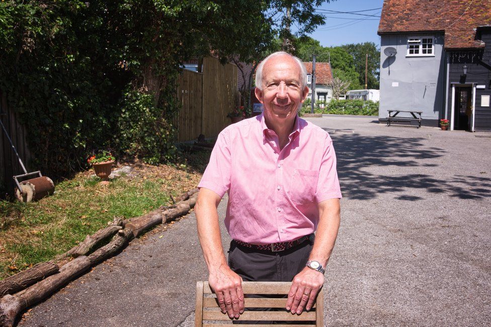 Neil Watts donated garden furniture to help the pub reopen
