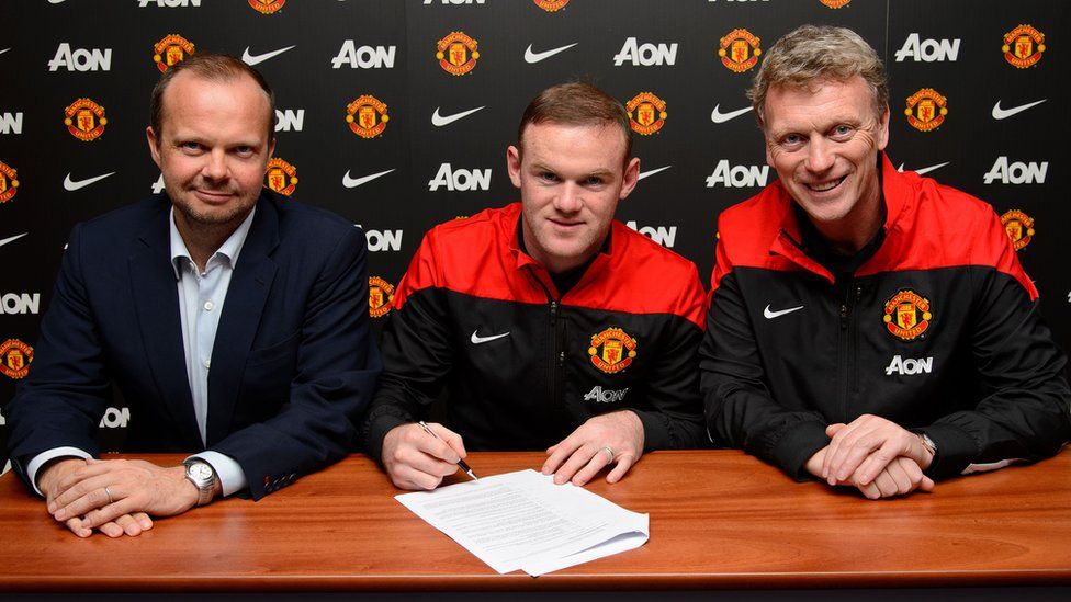 Rooney signs contract