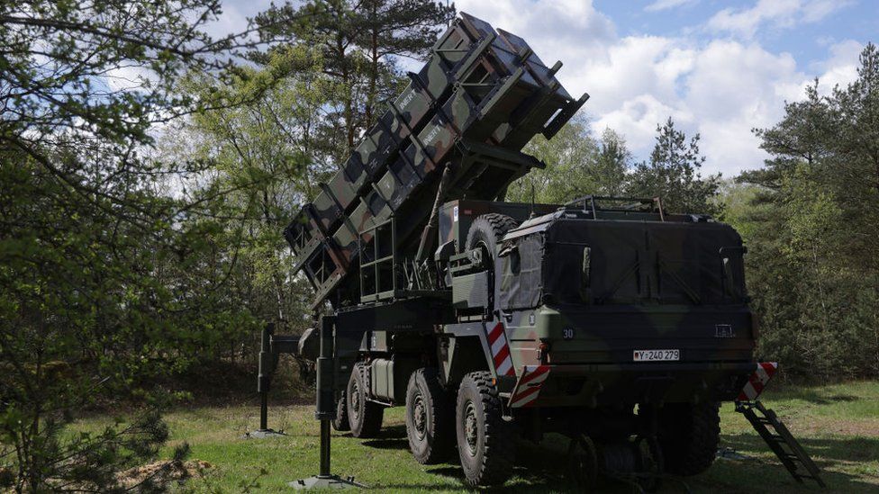 A launcher of a Patriot rocket  strategy   of the Bundeswehr, the German equipped  forces, stands during the "National Guardian" subject   workout  astatine  the Bundeswehr's vessel  grooming  grounds connected  April 18, 2024 successful  Munster, Germany