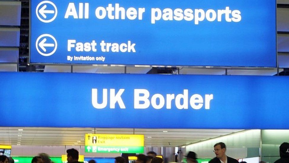 Queues at passport control at Heathrow Airport
