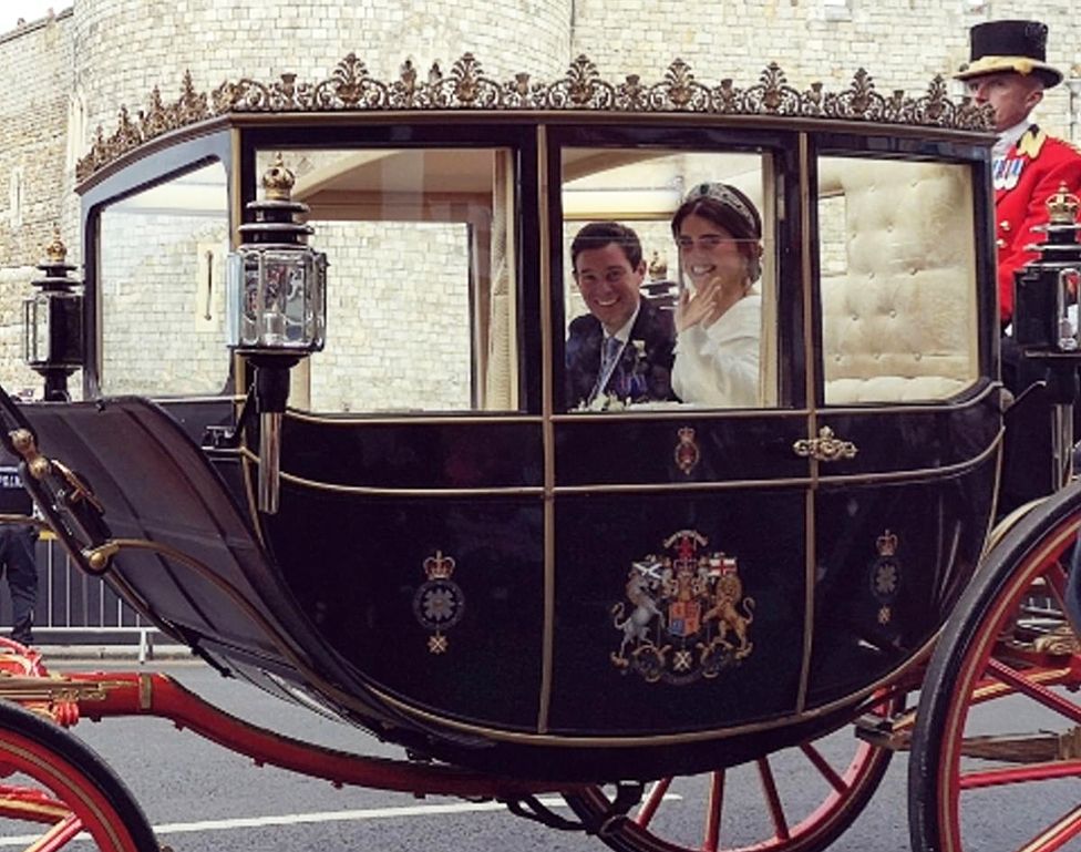 Princess Eugenie and Jack Brooksbank wave from their carriage