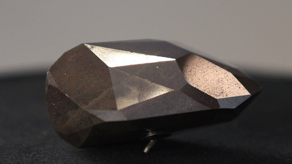 The Enigma: Billion-year-old black diamond sold for £3.16m - BBC News