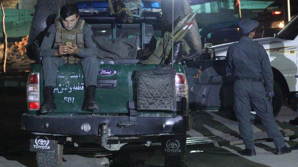Afghan police secure the scene after suspected militants attacked a Shia minority mosque in Kabul, Afghanistan, 15 June 2017