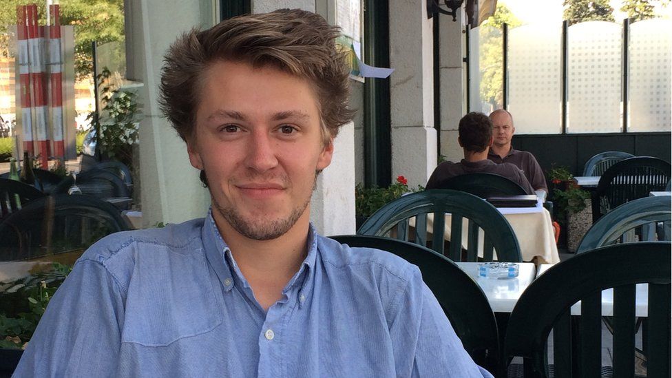 David Hyde, a UN intern from New Zealand, sitting at a Geneva cafe - August 2015