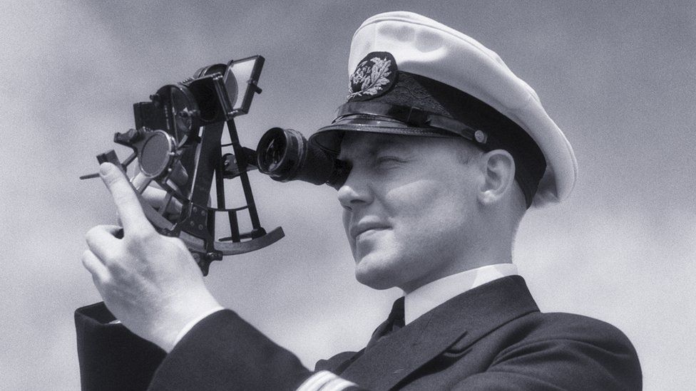 Officer using a sextant in the 1930s
