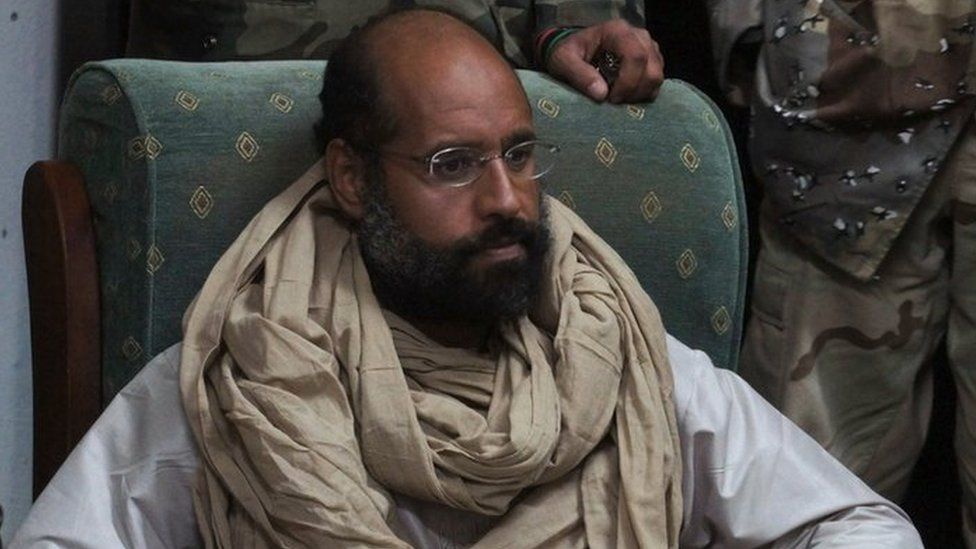 Saif al-Islam is seen after his capture, in the custody of revolutionary fighters in Obari, Libya November 19, 2011
