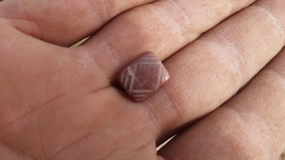 A seal made of carnelian stone found in the cave