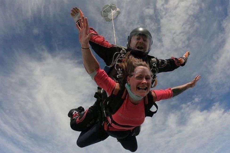 Gill and an instructor skydiving