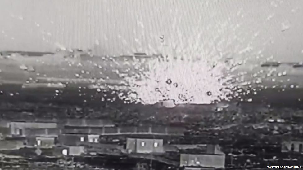 An explosion as a missile hits the ground.