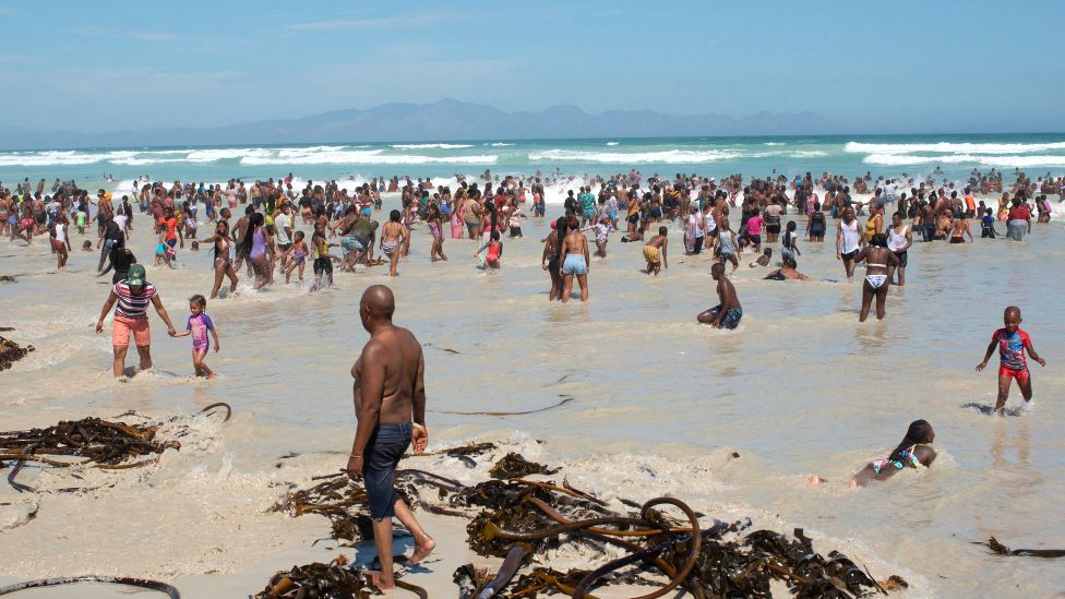 Crowds on Muizemberg beach in the Western Cape province, South Africa - - Saturday 22 January 2022