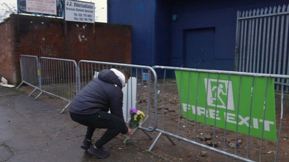 Flowers being laid