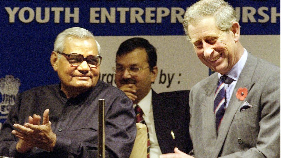 Indian Prime Minister Atal Behari Vajpayee (L) shares a joke with Britain's Prince Charles during an Asian Summit on Youth Enterpreneurship and Employment conference at India's Parliament in New Delhi, 2003