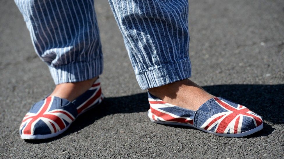Person in Union Jack shoes