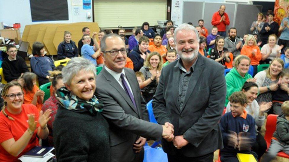 Head teacher Nikki Symmons, councillor Emlyn Dole and chairman of governors Owen Jenkins