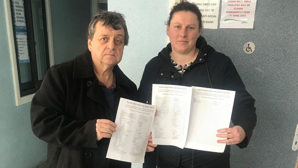 Councillor Kevin Etheridge and resident Janet Lane with a petition to save Blackwood bus station toilets