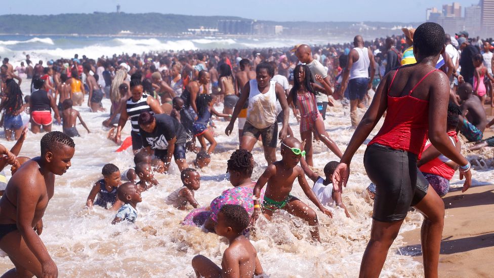 A packed beach in Durban, South Africa - Saturday 1 January 2022