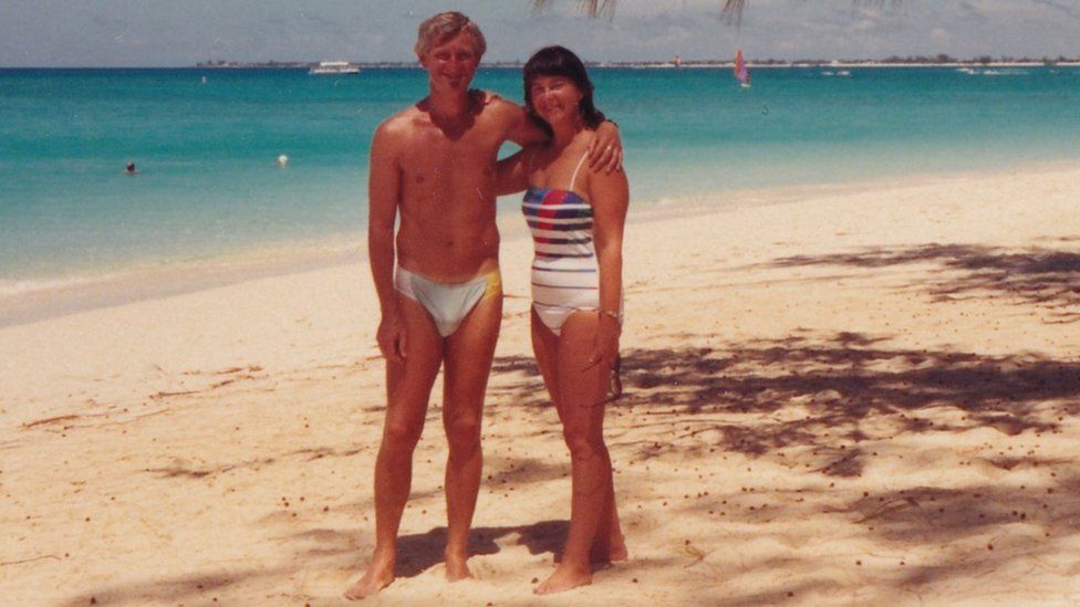 Young Bill and Judith on a beach