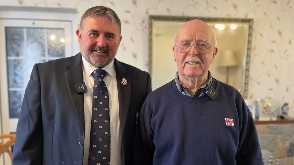 Photo Jason Hobbs (left) after telling 87-year-old Tony Hobbs that the new inshore lifeboat would be named after his dad