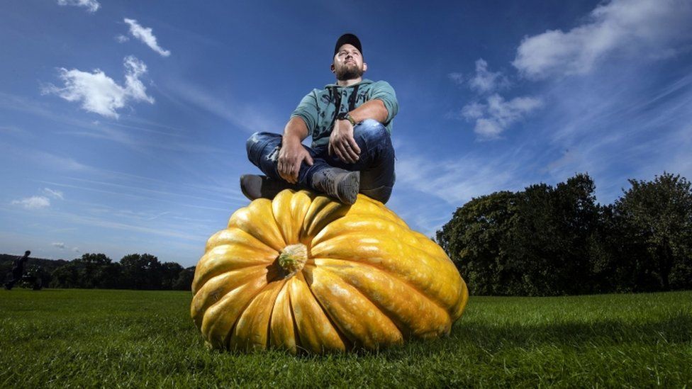 Richard Mann with his winning giant pumpkin weighing 291.7 kilos, the scooped 1st prize