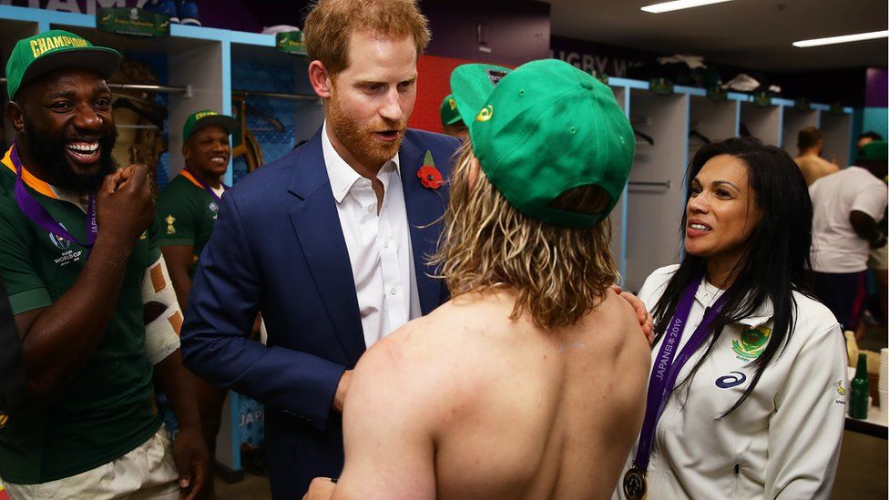 In this handout image provided by World Rugby Prince Harry, Duke of Sussex congratulates Faf de Klerk of South Africa following his team"s victory over England in the Rugby World Cup 2019 Final between England and South Africa at International Stadium Yokohama on November 02, 2019 in Yokohama, Kanagawa, Japan.