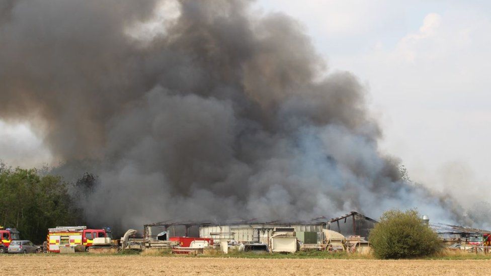 Parham fire: Overheated machinery caused airfield blaze - BBC News