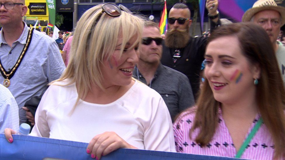 Michelle O'Neill parading with Sinn Féin colleagues at Belfast Pride