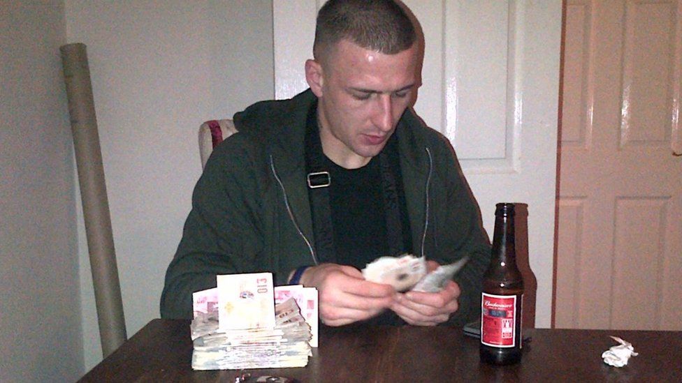 Nigel Barwell counting money