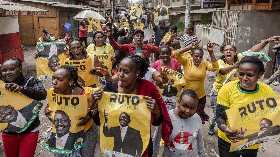 Supporters of Kenyan President elect William Ruto march while celebrating in the streets of the informal settlement of Mathare in Nairobi, Kenya, on September 5, 2022