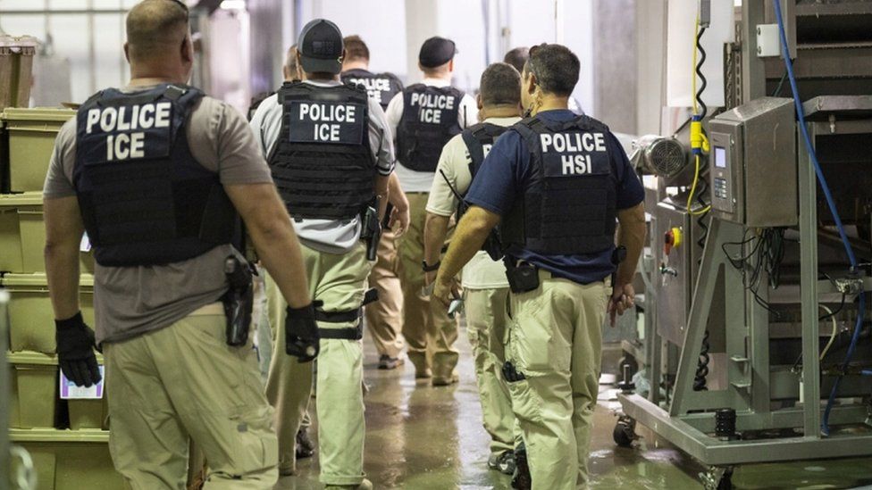 ICE agents at a raid in the US
