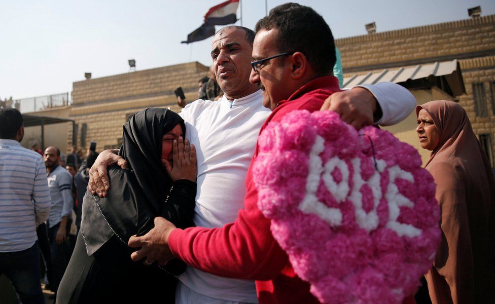 A released detainee hugs members of his family after Egyptian President Abdel Fattah al-Sisi issued a pardon for 203 youths jailed for taking part in demonstrations, as part of a pledge he made months ago to amend a protest law, in front of the main gate of Tora Prison in Tora, Egypt March 14, 2017