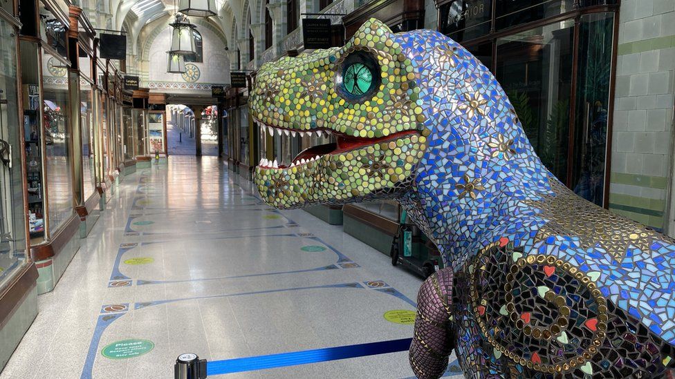 Mosaic dinosaur statue