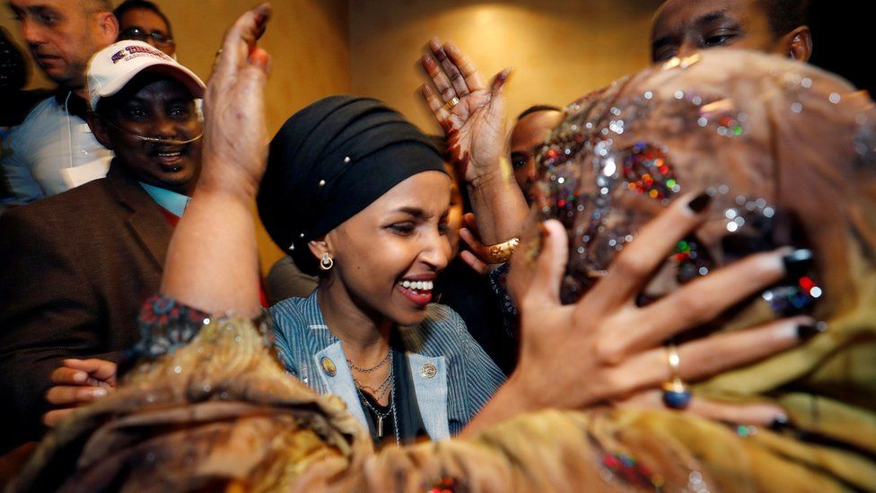 Democratic congressional candidate Ilhan Omar is greeted by her husband's mother