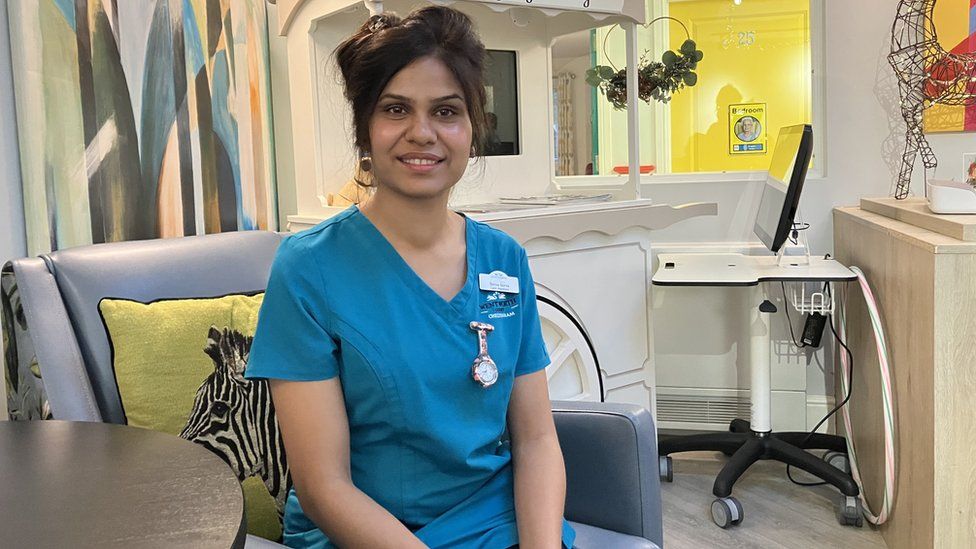 Nurse sitting in a chair