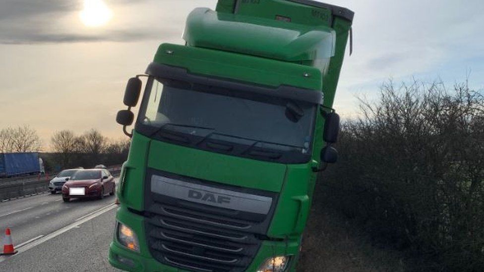 Lorry stuck in ditch