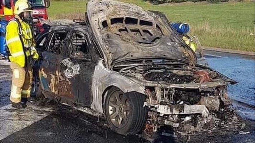 The police car destroyed by fire